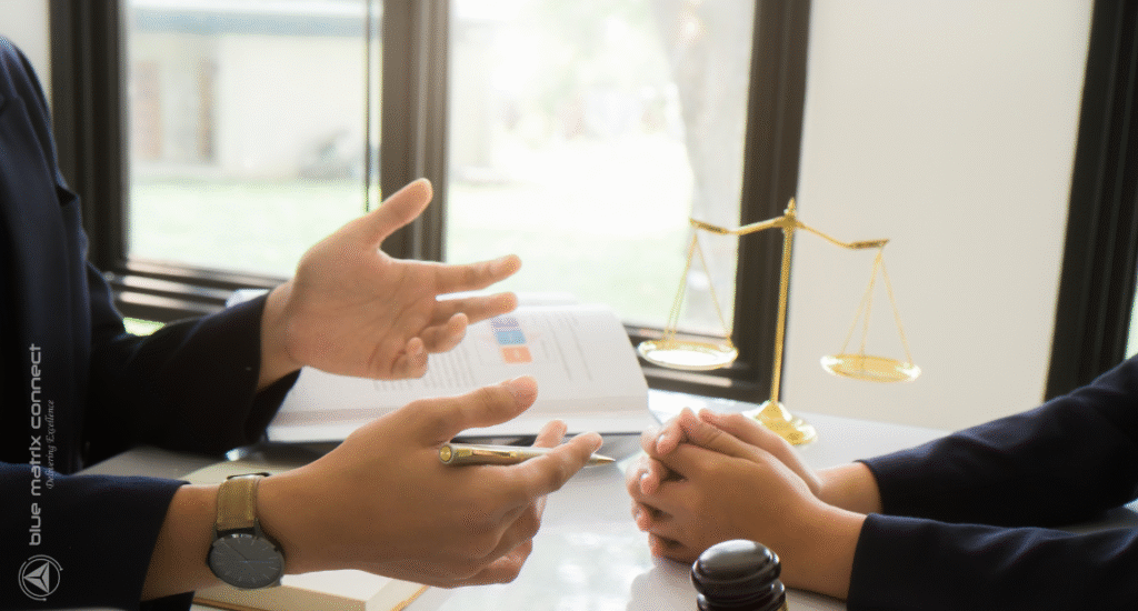 Close-up of business professionals reviewing compliance documents, symbolizing audit-ready files, trust, and accuracy in corporate compliance.